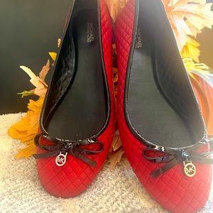 Michael Kors, red and black slipper type shoes.